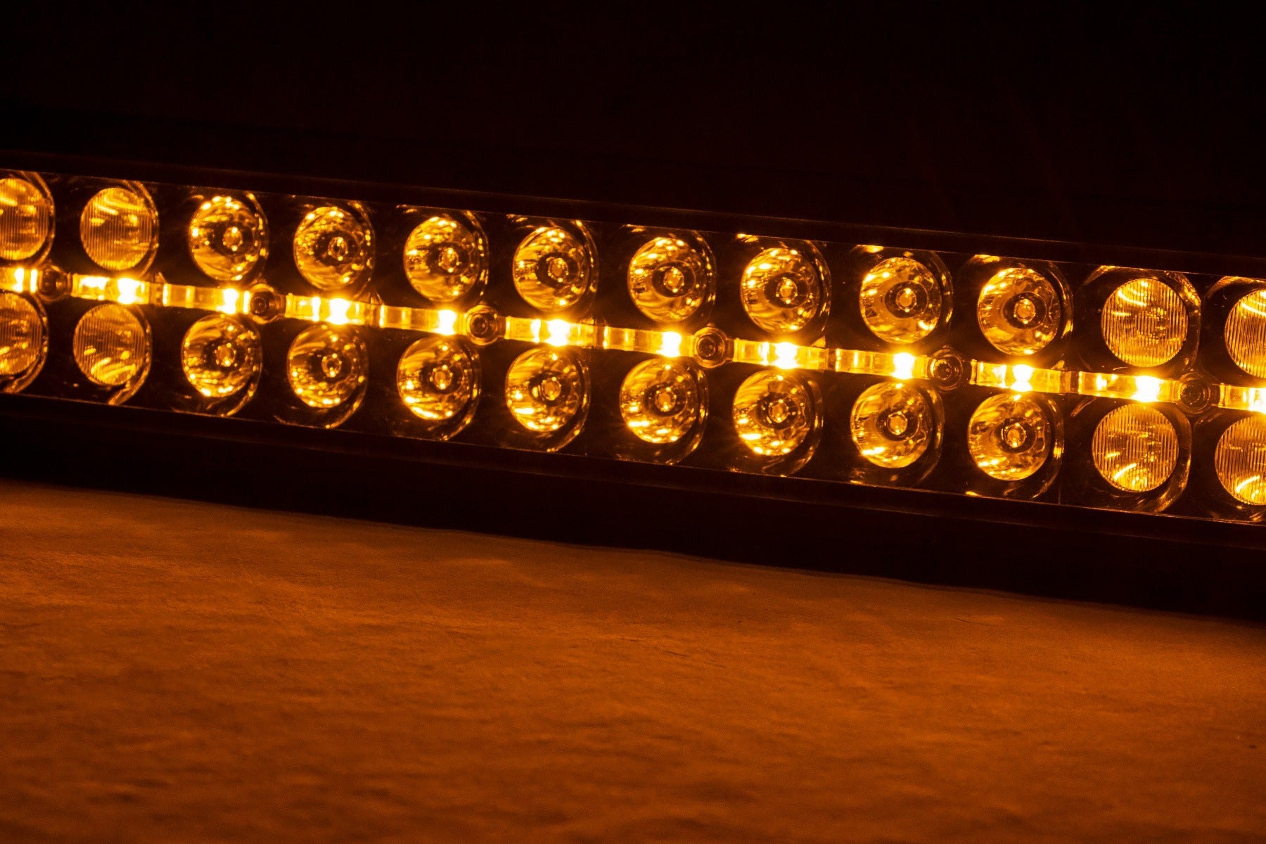 Rough Country 30 Inch Curved LED Light Bar - amber DRL lit at night