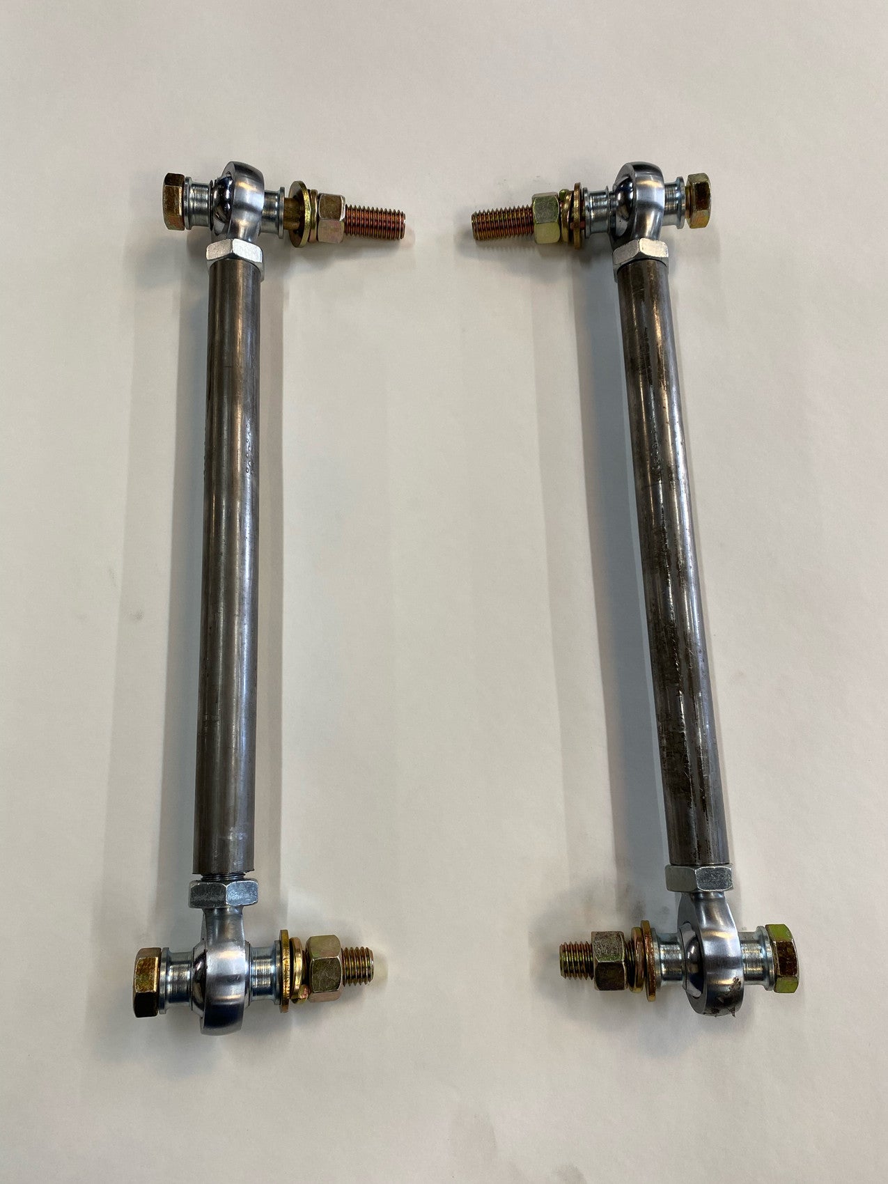 Stone Fab heim steering linkage for narrowed control arms on 1988-1998 Chevy GMC C1500